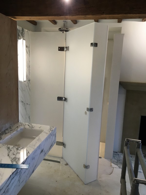Bespoke frosted glass shower enclosure in Feltham luxury bathroom