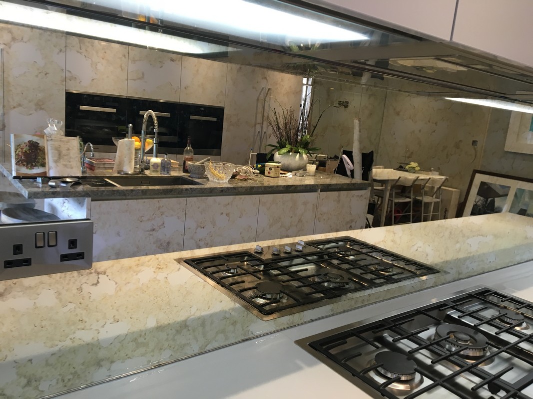 Mirror glass splashback in Feltham luxury kitchen